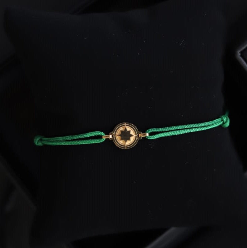 Brujula relieve pulsera oro18kt