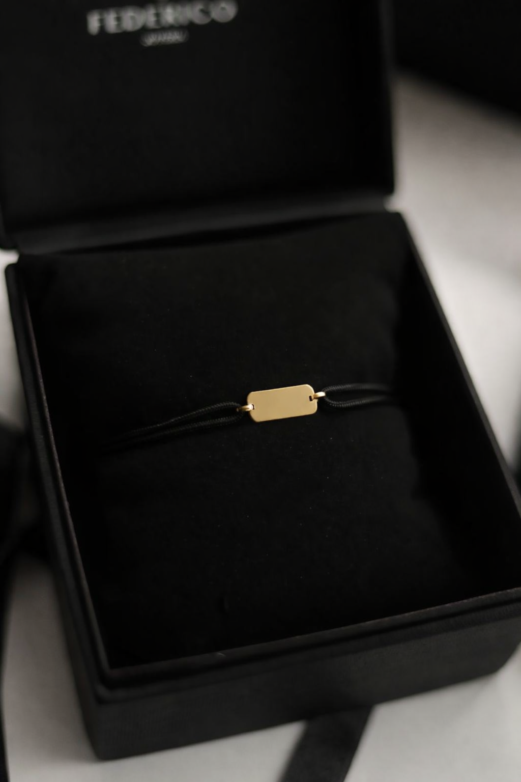 Pulsera inscripción esencial oro 18 kt