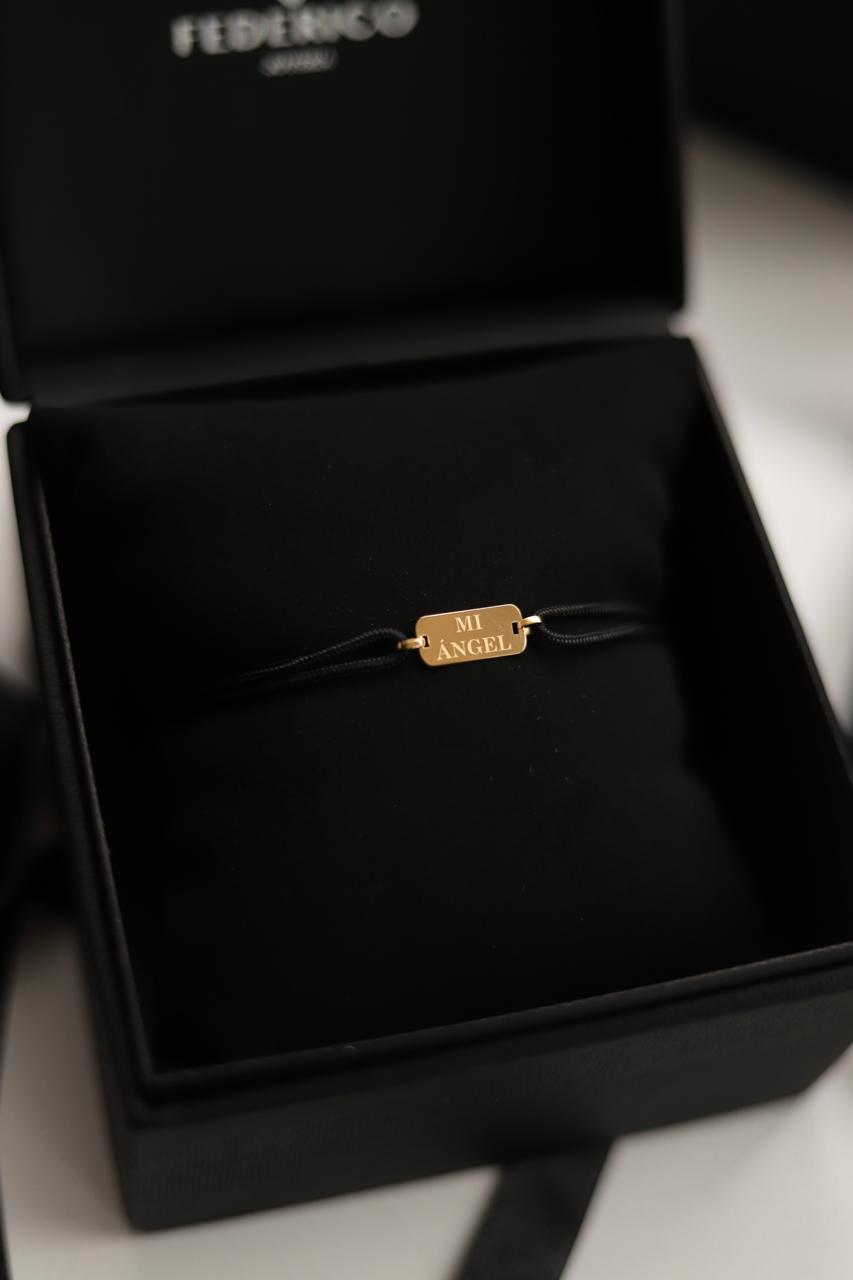 Pulsera inscripción esencial oro 18 kt