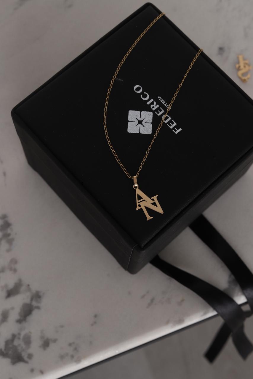 Dije inicial doble sólida oro 18kt
