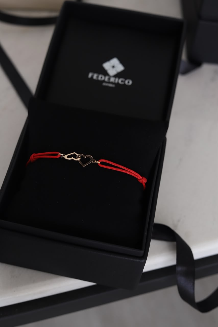 Pulsera dos corazones entrelazados oro 18 kt
