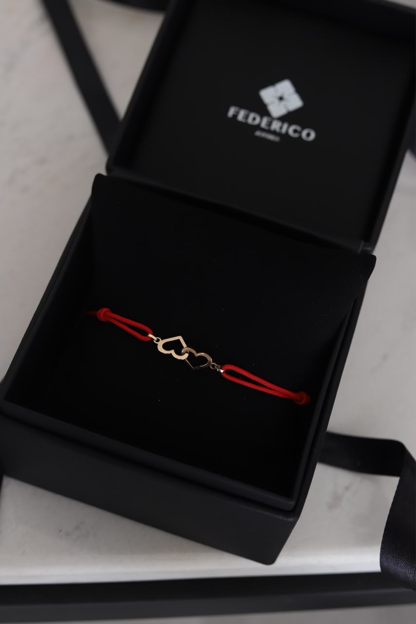 Pulsera dos corazones entrelazados oro 18 kt