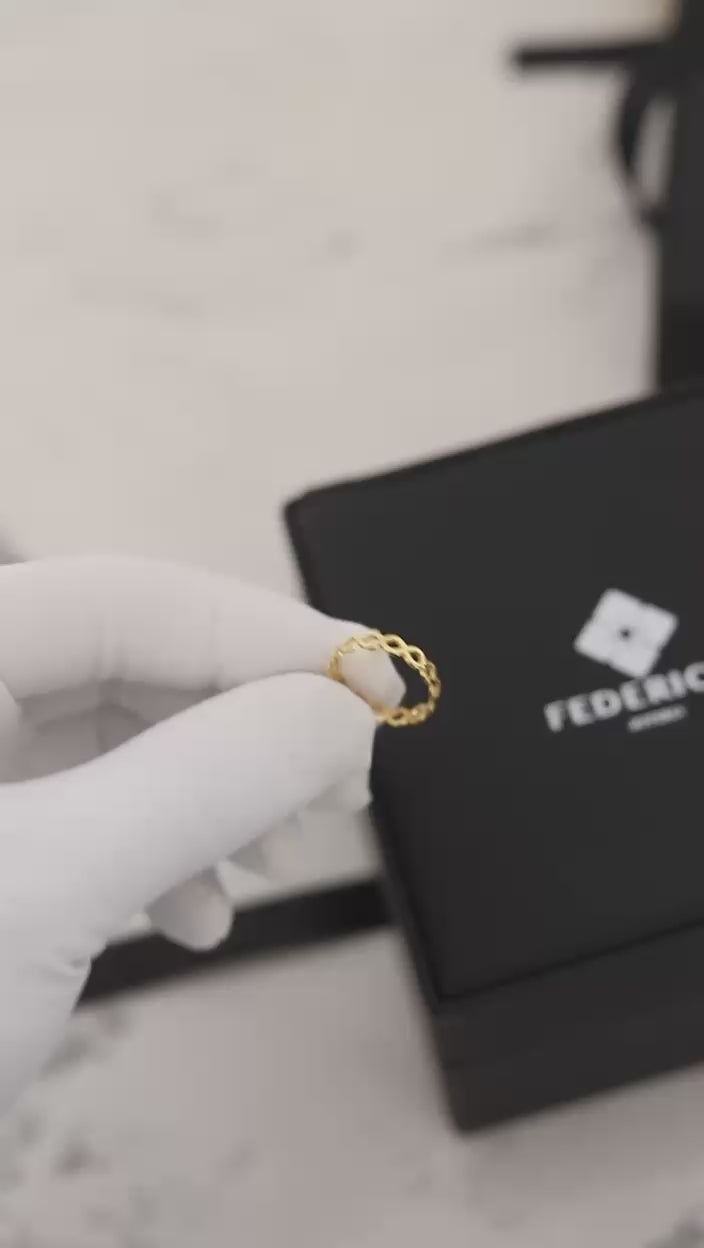 Anillo infinitos entrelazados oro 18 Kt