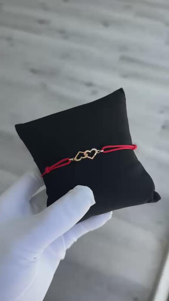 Pulsera dos corazones entrelazados oro 18 kt