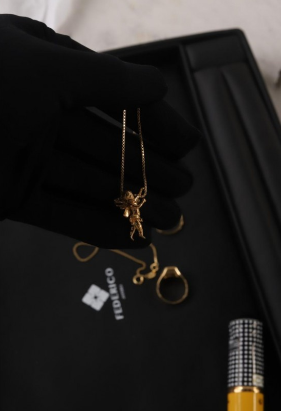 Querubín Dije en oro de 18kt