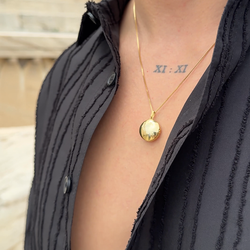 Dije Relicario circular oro solido de 18kt